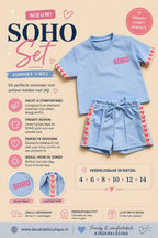 Lichtblauwe SOHO meisjes zomerset met roze hartjesdetails bestaande uit een T-shirt en korte broek, verkrijgbaar in maten 4 t/m 14 bij DeNa Kids Boutique.