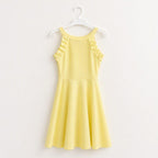 "Gele meisjesjurk met strik – detailfoto | DeNa Kids Boutique"