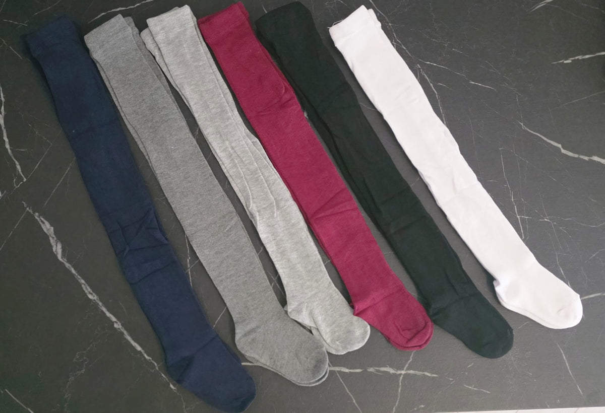 Kindermaillots van zacht katoen in de kleuren donkerblauw, grijs, lichtgrijs, bordeaux, donkergroen en wit, geschikt voor dagelijks gebruik en feestelijke outfits