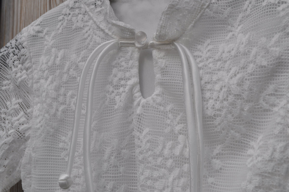 Witte kanten blouse meisjes strikkoordjes en kant detail halsopening