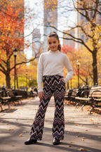 Crème trui met zigzag flared broek meisjes stadspark