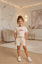 Meisjes beige SOHO set met fuchsia hartjes details - model 3 - luxe interieur | DeNa Fashion