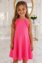 Meisjes roze halter zomerjurk met ruches en strik - model 1 - luxe interieur | DeNa Fashion