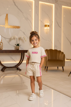 Meisjes beige SOHO set met fuchsia hartjes details - model 2 - luxe interieur | DeNa Fashion