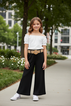 Meisjes zomerset zwart-wit lange broek vloerlang kindmodel stadspark